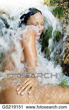Stock Photography - woman in the nude 
in a gush of water. 
fotosearch - search 
stock photos, 
pictures, images, 
and photo clipart