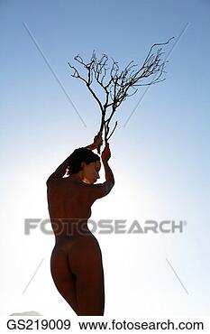 Stock Photograph - woman in the nude 
holding two branches. 
fotosearch - search 
stock photos, 
pictures, images, 
and photo clipart