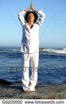 Stock Photo - woman practising 
martial arts on 
the seashore. 
fotosearch - search 
stock photos, 
pictures, images, 
and photo clipart