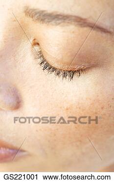 Stock Photography - close up of a 
woman's face with 
closed eyes. fotosearch 
- search stock 
photos, pictures, 
images, and photo 
clipart