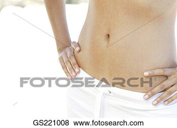 Stock Photo - close up of a 
woman with hands 
on her hips. fotosearch 
- search stock 
photos, pictures, 
images, and photo 
clipart