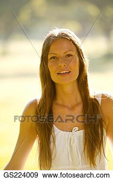 Stock Photograph - portrait of a 
dark-haired woman, 
with long hair. 
fotosearch - search 
stock photos, 
pictures, images, 
and photo clipart