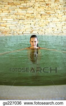 Stock Photo - woman posing in 
water. fotosearch 
- search stock 
photos, pictures, 
images, and photo 
clipart