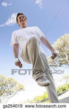 Arquivo Fotográficos - homem,  levantamento, 
 livre,  pesos. 
fotosearch - busca 
de fotos, imagens 
e clipart