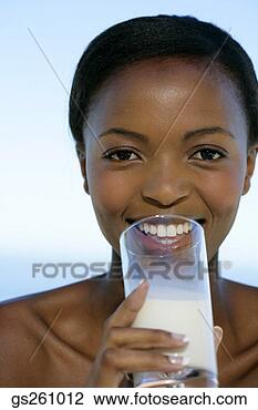 Stock Photo - woman drinking 
milk. fotosearch 
- search stock 
photos, pictures, 
images, and photo 
clipart
