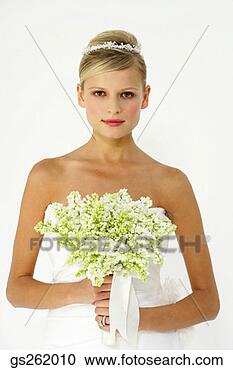 Arquivo de Fotografias - mulher,  segurando, 
 buquet. fotosearch 
- busca de fotos, 
imagens e clipart