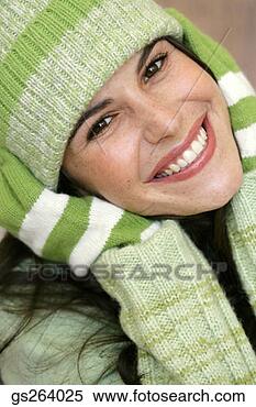Stock Image - woman wearing 
hat and gloves. 
fotosearch - search 
stock photos, 
pictures, images, 
and photo clipart