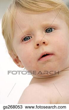 Stock Photo - baby with serious 
expression. fotosearch 
- search stock 
photos, pictures, 
images, and photo 
clipart
