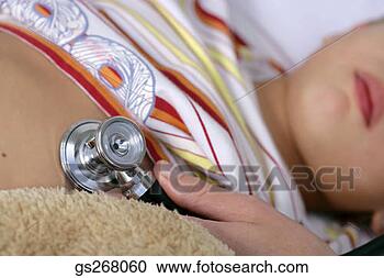 Stock Photography - stethoscope held 
to child's chest. 
fotosearch - search 
stock photos, 
pictures, images, 
and photo clipart