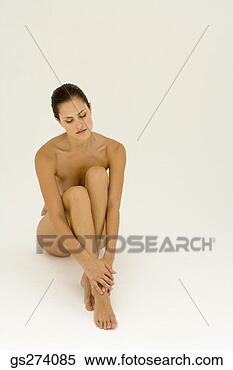Stock Image - naked seated woman. 
fotosearch - search 
stock photos, 
pictures, images, 
and photo clipart