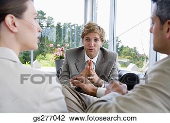 Stock Photo - businesspeople 
in meeting. fotosearch 
- search stock 
photos, pictures, 
images, and photo 
clipart