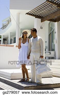 Picture - couple standing 
on deck. fotosearch 
- search stock 
photos, pictures, 
images, and photo 
clipart
