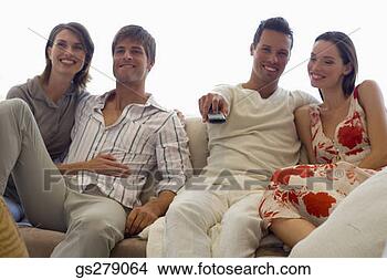 Stock Photo - couples sitting 
on couch. fotosearch 
- search stock 
photos, pictures, 
images, and photo 
clipart
