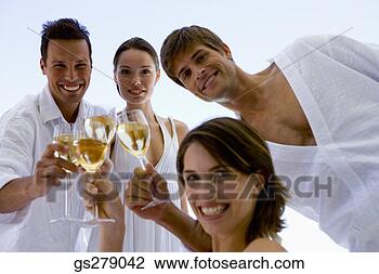 Stock Photo - small group of 
people posing 
with wine. fotosearch 
- search stock 
photos, pictures, 
images, and photo 
clipart