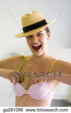 Stock Photo - playful woman 
with apples in 
bra. fotosearch 
- search stock 
photos, pictures, 
images, and photo 
clipart