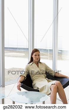 Stock Photo - businesswoman 
lounging. fotosearch 
- search stock 
photos, pictures, 
images, and photo 
clipart