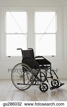 Stock Photo - wheelchair in 
empty room. fotosearch 
- search stock 
photos, pictures, 
images, and photo 
clipart