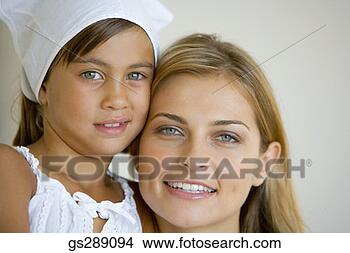 Stock Photo - portrait of happy 
mother and daughter. 
fotosearch - search 
stock photos, 
pictures, images, 
and photo clipart