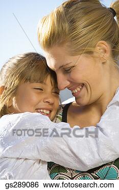 Stock Photo - portrait of mother 
and daughter. 
fotosearch - search 
stock photos, 
pictures, images, 
and photo clipart