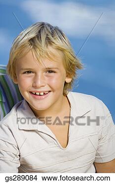 Stock Photo - portrait of smiling 
boy. fotosearch 
- search stock 
photos, pictures, 
images, and photo 
clipart