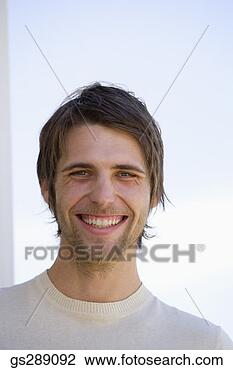 Stock Photo - portrait of smiling 
man. fotosearch 
- search stock 
photos, pictures, 
images, and photo 
clipart