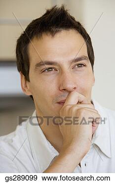 Stock Photograph - portrait of thoughtful 
man. fotosearch 
- search stock 
photos, pictures, 
images, and photo 
clipart