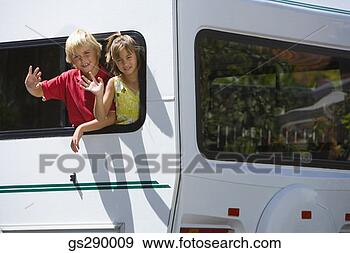 Stock Photograph - children waving 
from mobile home 
window. fotosearch 
- search stock 
photos, pictures, 
images, and photo 
clipart