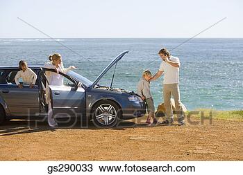 Stock Photo - family with car 
trouble. fotosearch 
- search stock 
photos, pictures, 
images, and photo 
clipart