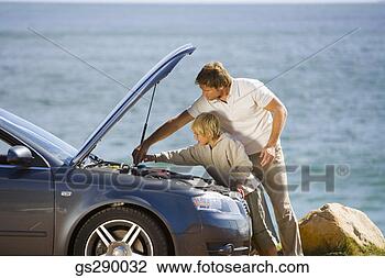 Stock Photo - father and son 
with car trouble. 
fotosearch - search 
stock photos, 
pictures, images, 
and photo clipart