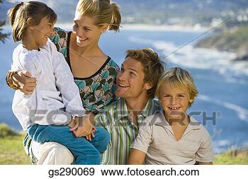 Stock Photograph - portrait of a 
family. fotosearch 
- search stock 
photos, pictures, 
images, and photo 
clipart