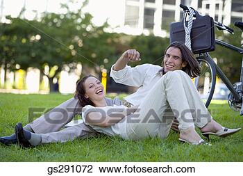 Stock Photo - businesspeople 
laughing outdoors. 
fotosearch - search 
stock photos, 
pictures, images, 
and photo clipart
