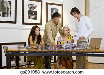 Stock Photo - businesspeople 
in meeting. fotosearch 
- search stock 
photos, pictures, 
images, and photo 
clipart