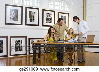 Stock Photograph - businesspeople 
in meeting. fotosearch 
- search stock 
photos, pictures, 
images, and photo 
clipart