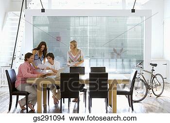 Stock Photo - businesspeople 
in meeting. fotosearch 
- search stock 
photos, pictures, 
images, and photo 
clipart