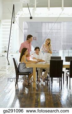 Stock Photo - businesspeople 
in meeting. fotosearch 
- search stock 
photos, pictures, 
images, and photo 
clipart