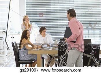 Picture - businesspeople 
in meeting. fotosearch 
- search stock 
photos, pictures, 
images, and photo 
clipart