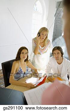 Stock Photography - businesspeople 
in meeting. fotosearch 
- search stock 
photos, pictures, 
images, and photo 
clipart