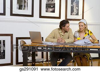 Stock Photography - businesspeople 
working. fotosearch 
- search stock 
photos, pictures, 
images, and photo 
clipart