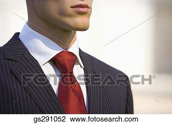 Stock Photo - man in business 
attire. fotosearch 
- search stock 
photos, pictures, 
images, and photo 
clipart