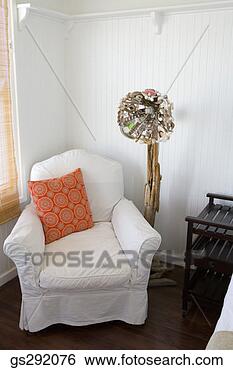 Stock Photo - armchair in corner 
of room. fotosearch 
- search stock 
photos, pictures, 
images, and photo 
clipart