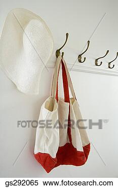 Stock Image - bag and hat hanging 
on hooks. fotosearch 
- search stock 
photos, pictures, 
images, and photo 
clipart