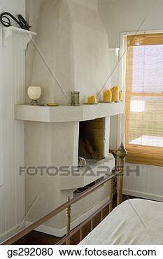 Stock Photography - candles on mantle 
of fireplace in 
bedroom. fotosearch 
- search stock 
photos, pictures, 
images, and photo 
clipart