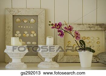 Stock Photo - candles and picture 
frames on mantle. 
fotosearch - search 
stock photos, 
pictures, images, 
and photo clipart