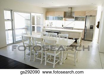 Stock Photography - dining room table 
in kitchen. fotosearch 
- search stock 
photos, pictures, 
images, and photo 
clipart