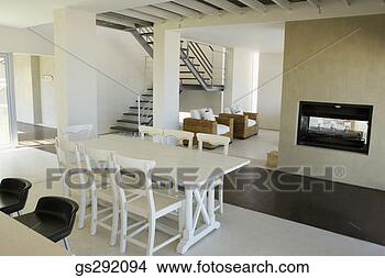 Stock Photo - dining room table 
by staircase. 
fotosearch - search 
stock photos, 
pictures, images, 
and photo clipart