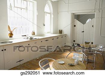 Stock Photography - kitchen in studio 
apartment. fotosearch 
- search stock 
photos, pictures, 
images, and photo 
clipart
