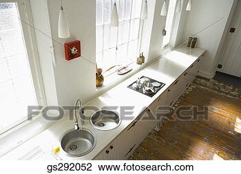 Stock Photo - kitchen in studio 
apartment. fotosearch 
- search stock 
photos, pictures, 
images, and photo 
clipart