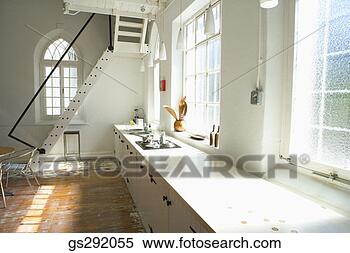 Stock Image - kitchen in studio 
apartment. fotosearch 
- search stock 
photos, pictures, 
images, and photo 
clipart