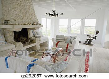 Picture - stone fireplace 
in living room. 
fotosearch - search 
stock photos, 
pictures, images, 
and photo clipart