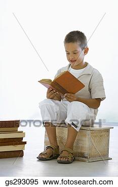Stock Image - boy reading book. 
fotosearch - search 
stock photos, 
pictures, images, 
and photo clipart